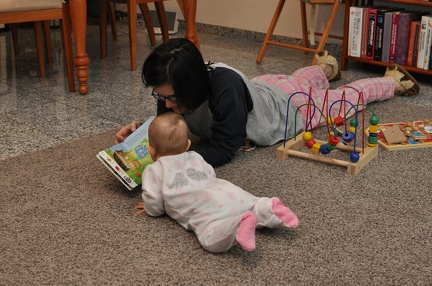 with mommy reading a book
